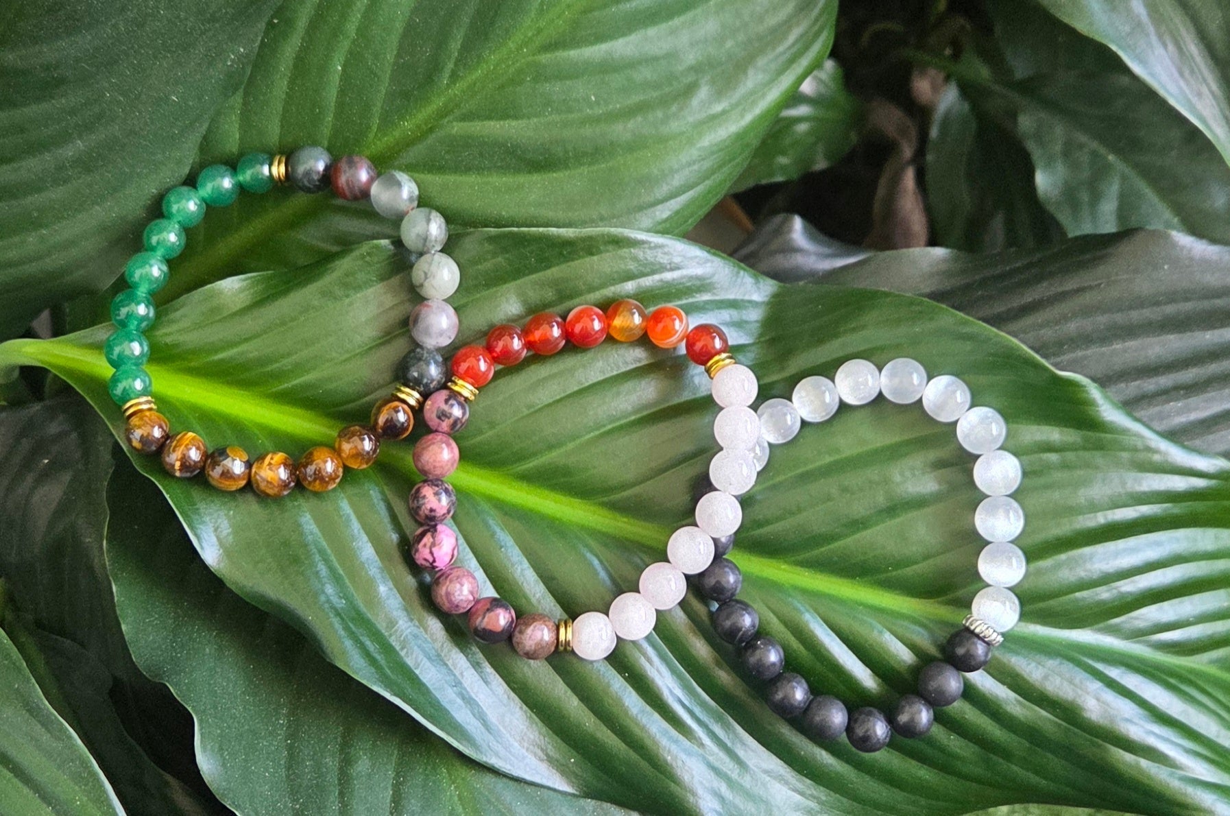 Collection of natural gemstone beaded bracelets